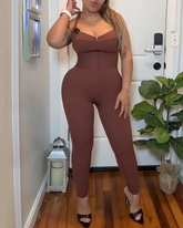 Mono ajustado con control de abdomen y cremallera frontal