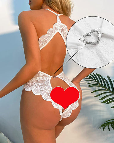 Pijama de una pieza sexy con escote en V profundo, encaje, entrepierna abierta, espalda descubierta y decoración en forma de corazón