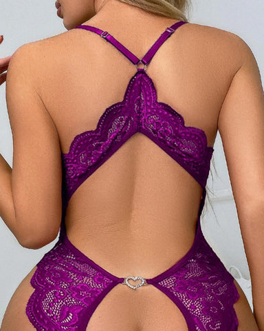 Pijama de una pieza sexy con escote en V profundo, encaje, entrepierna abierta, espalda descubierta y decoración en forma de corazón