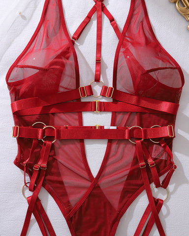 Body sexy con tirantes metálicos, espalda descubierta y malla transparente