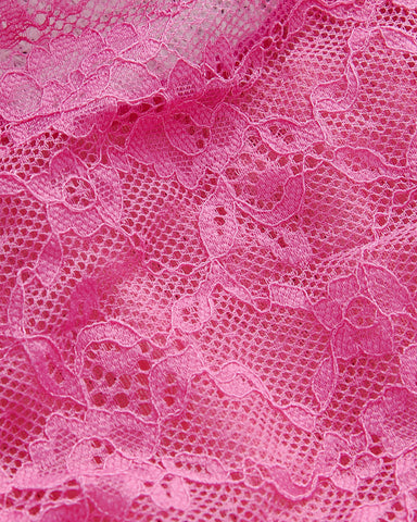 Conjunto de body sexy transparente con encaje floral en bloques de colores y medias